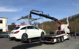 Фото эвакуатора с манипулятором компании «ЭвакуаторПрофи»